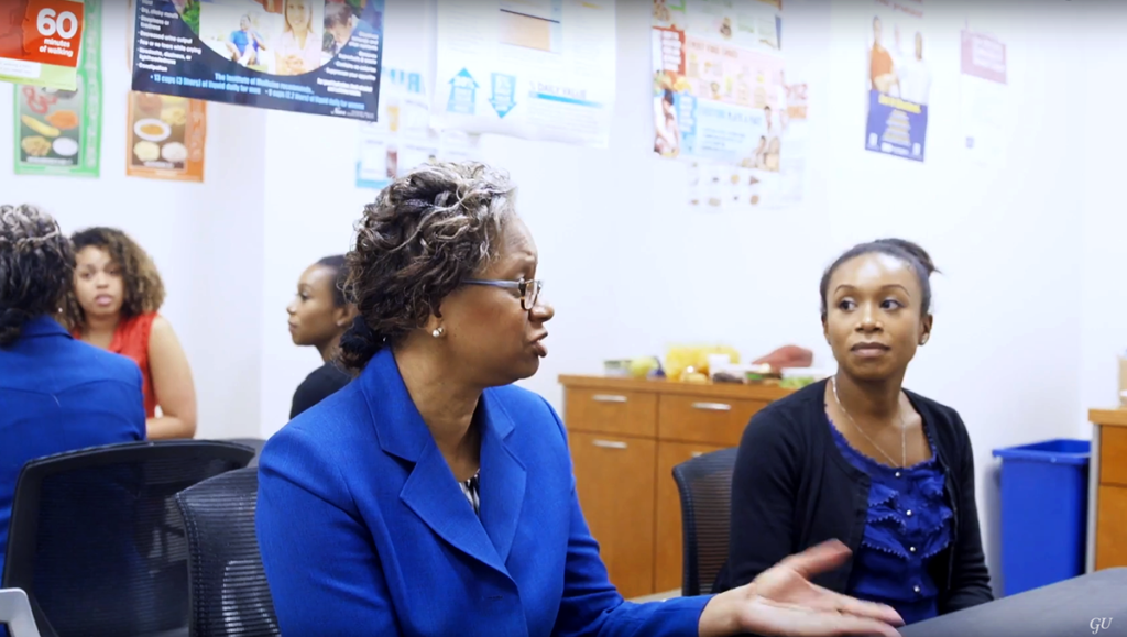 Lucile Adams-Campbell speaks with students